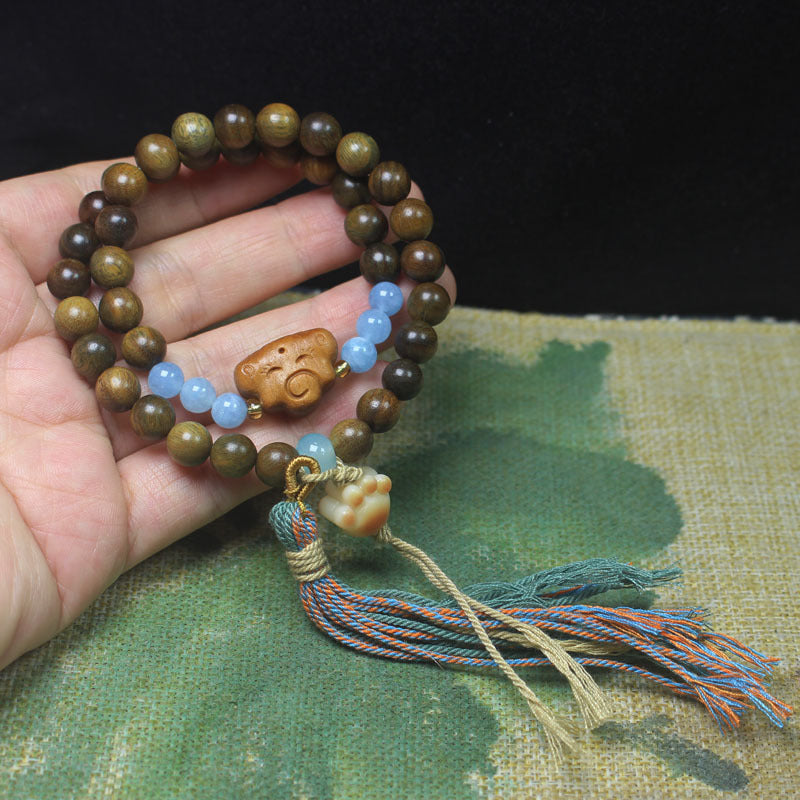 Green Sandalwood Double Loop Bracelet – Cloud & Blue Bead Tassel Design