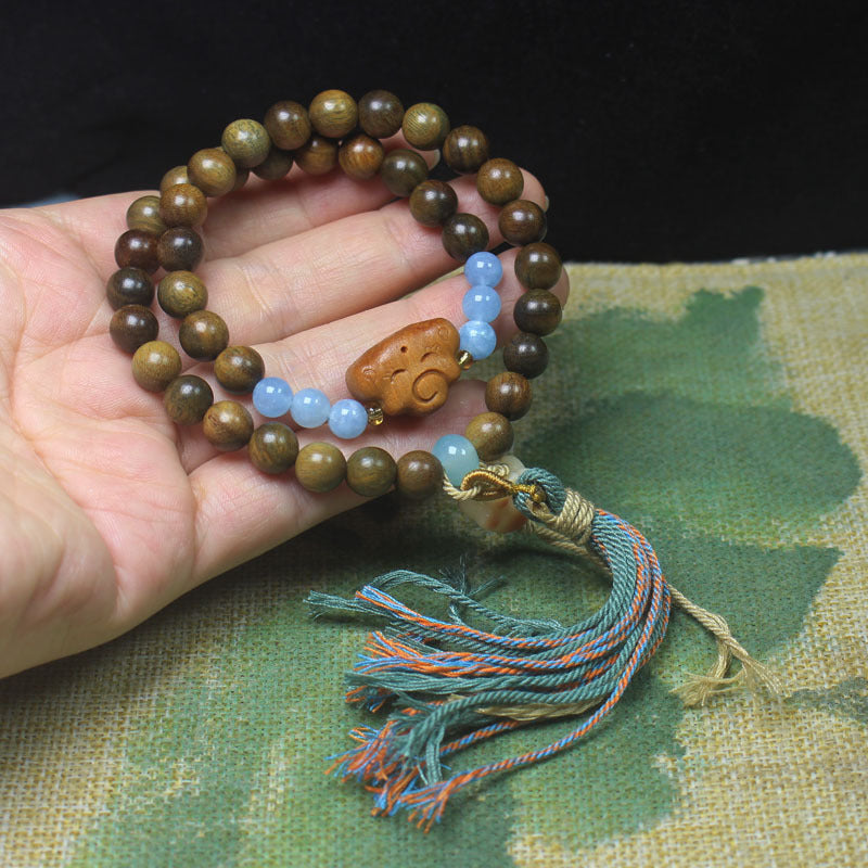 Green Sandalwood Double Loop Bracelet – Cloud & Blue Bead Tassel Design