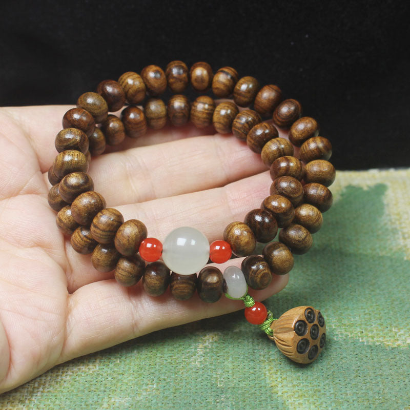 Double-Wrap Ebony Abacus Bead Bracelet – 9mm with Lotus Pod & Jade-Like Accents