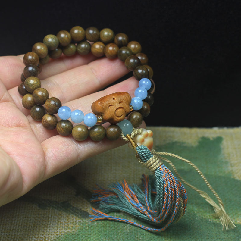 Green Sandalwood Double Loop Bracelet – Cloud & Blue Bead Tassel Design