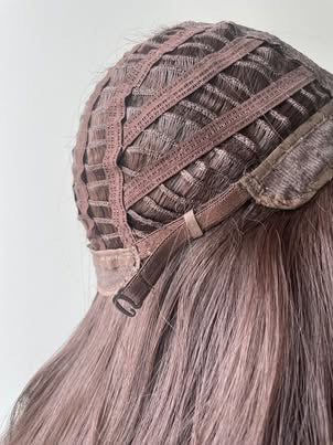 Synthetic wig cap interior with adjustable strap and open-weft construction
