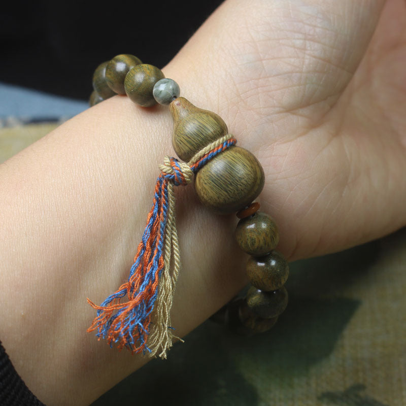 Green Sandalwood Bead Bracelet – 10mm with Gourd Charm & Colorful Tassel