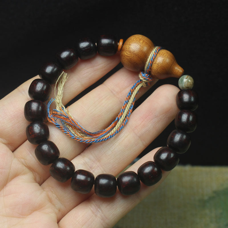 Dark Sandalwood-Style Bracelet – 9mm Beads with Pear Wood Gourd & Tassel
