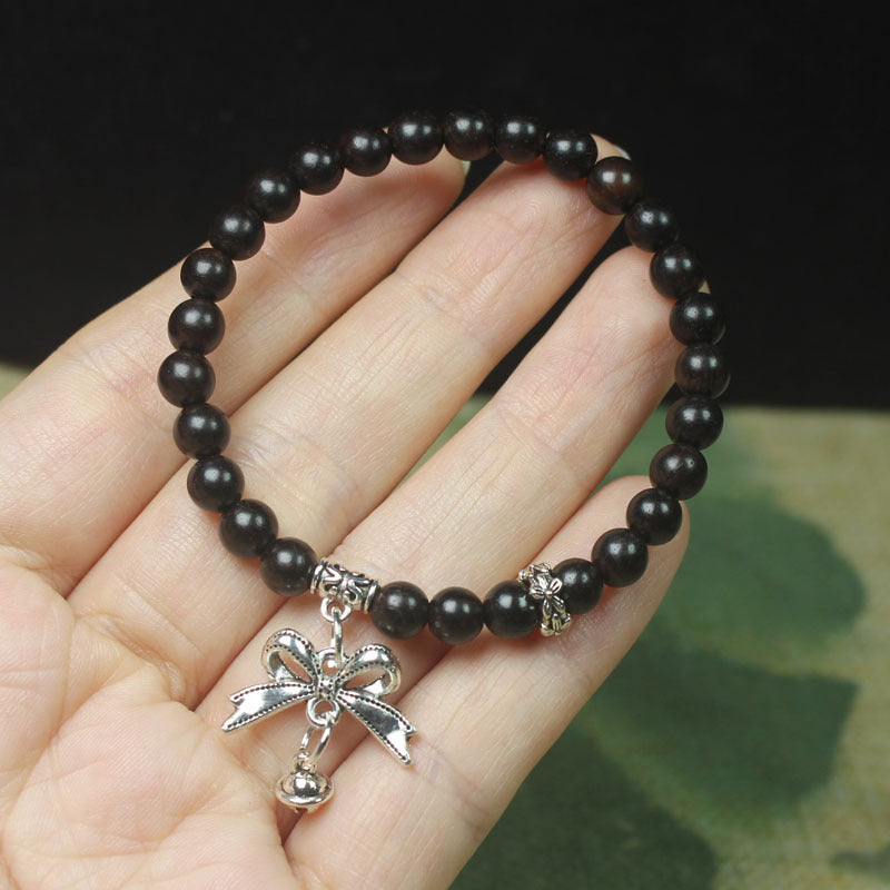 Ebony Wood Bead Bracelet – 6mm with Bow Charm & Bell Pendant, Elastic Fit