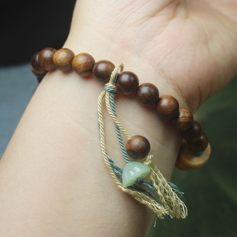 Ebony-Style Bracelet with Lucky Cat Charm – 8mm Beads, Tassel Accent