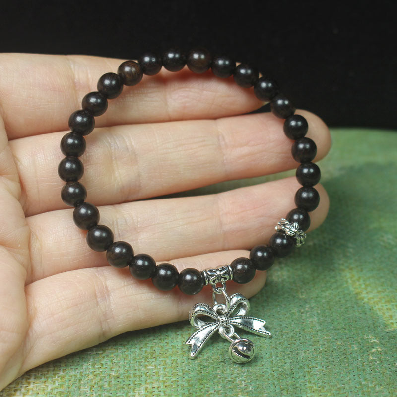 Ebony Wood Bead Bracelet – 6mm with Bow Charm & Bell Pendant, Elastic Fit