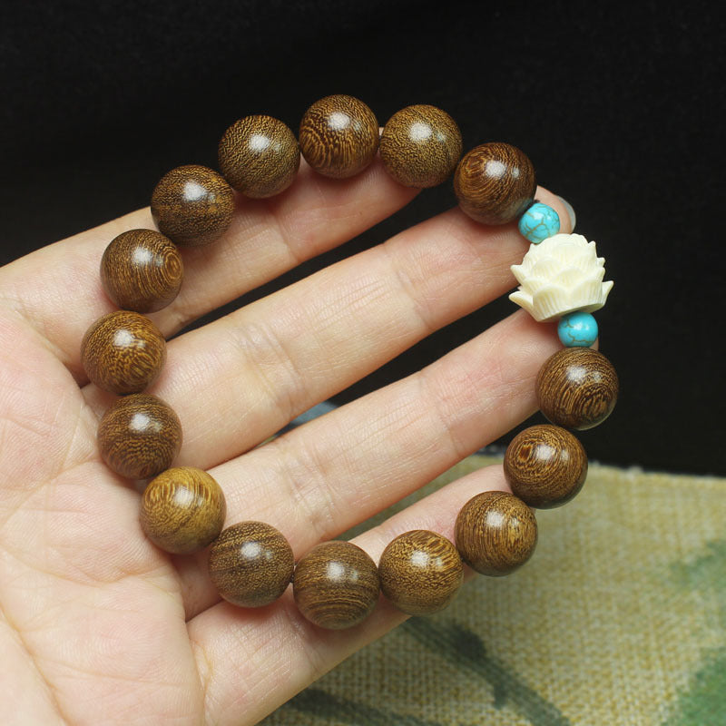 Gold Sandalwood Lotus Bracelet – 12mm Beads with White Lotus & Turquoise Accents