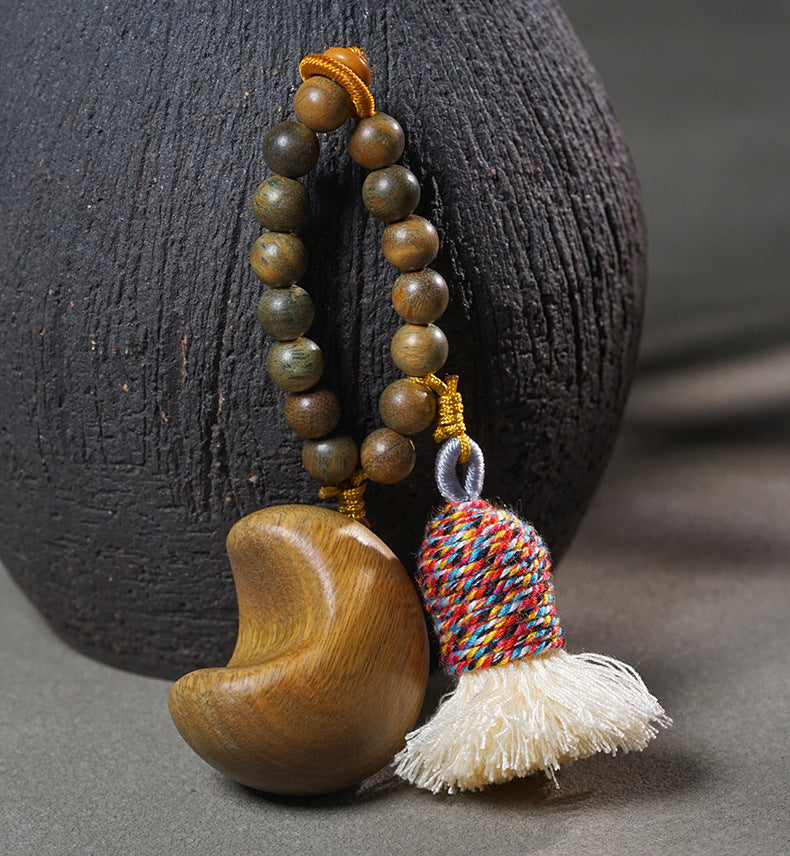 Handcrafted Green Sandalwood Charms – Star & Moon Tassel Keychain