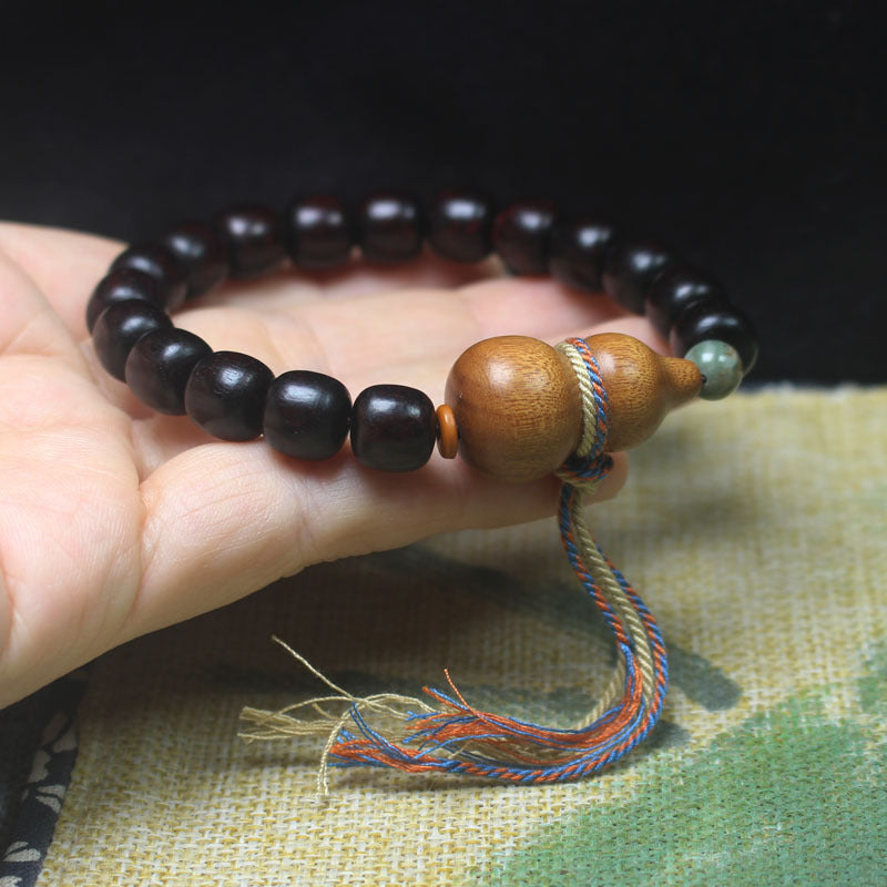 Dark Sandalwood-Style Bracelet – 9mm Beads with Pear Wood Gourd & Tassel