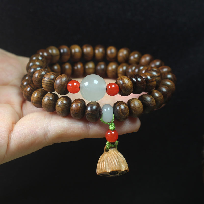 Double-Wrap Ebony Abacus Bead Bracelet – 9mm with Lotus Pod & Jade-Like Accents