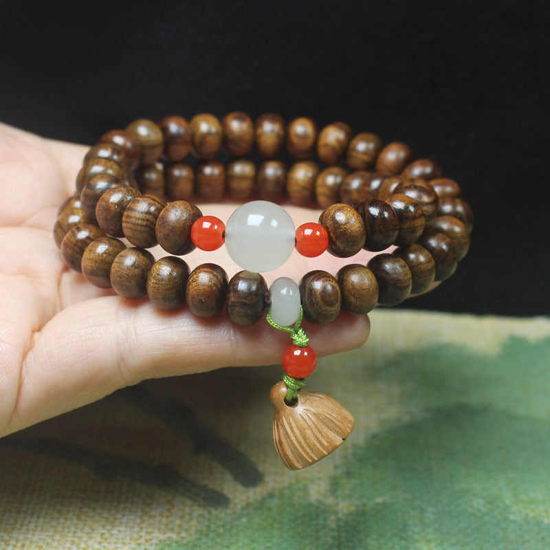 Double-Wrap Ebony Abacus Bead Bracelet – 9mm with Lotus Pod & Jade-Like Accents