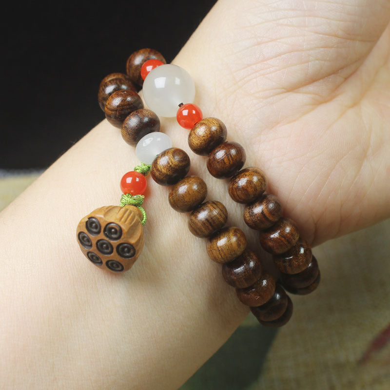 Double-Wrap Ebony Abacus Bead Bracelet – 9mm with Lotus Pod & Jade-Like Accents