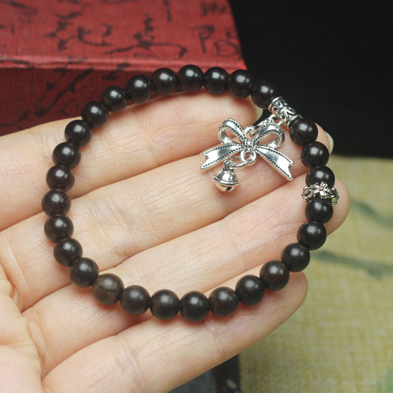 Ebony Wood Bead Bracelet – 6mm with Bow Charm & Bell Pendant, Elastic Fit
