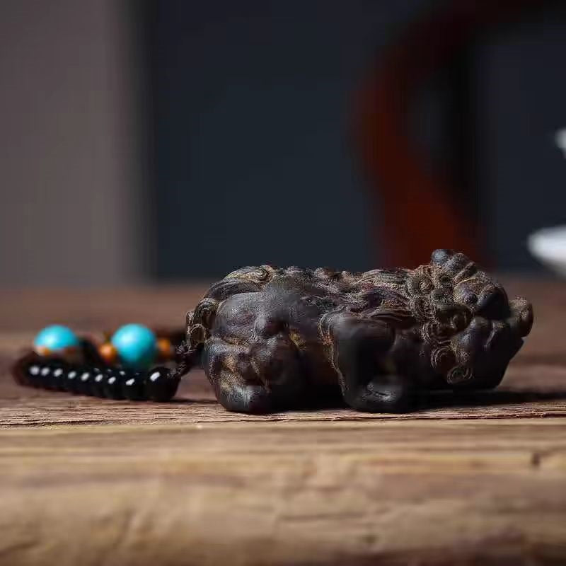 Agarwood Carved Pixiu Pendant – One-Horned Wealth Beast, Dark Finish