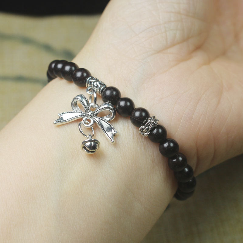 Ebony Wood Bead Bracelet – 6mm with Bow Charm & Bell Pendant, Elastic Fit