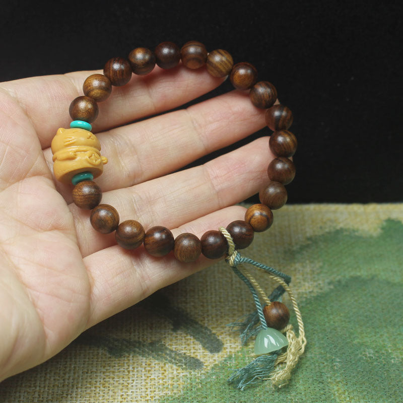 Ebony-Style Bracelet with Lucky Cat Charm – 8mm Beads, Tassel Accent