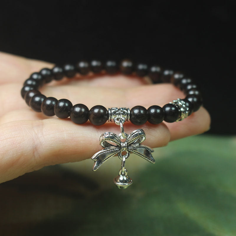 Ebony Wood Bead Bracelet – 6mm with Bow Charm & Bell Pendant, Elastic Fit