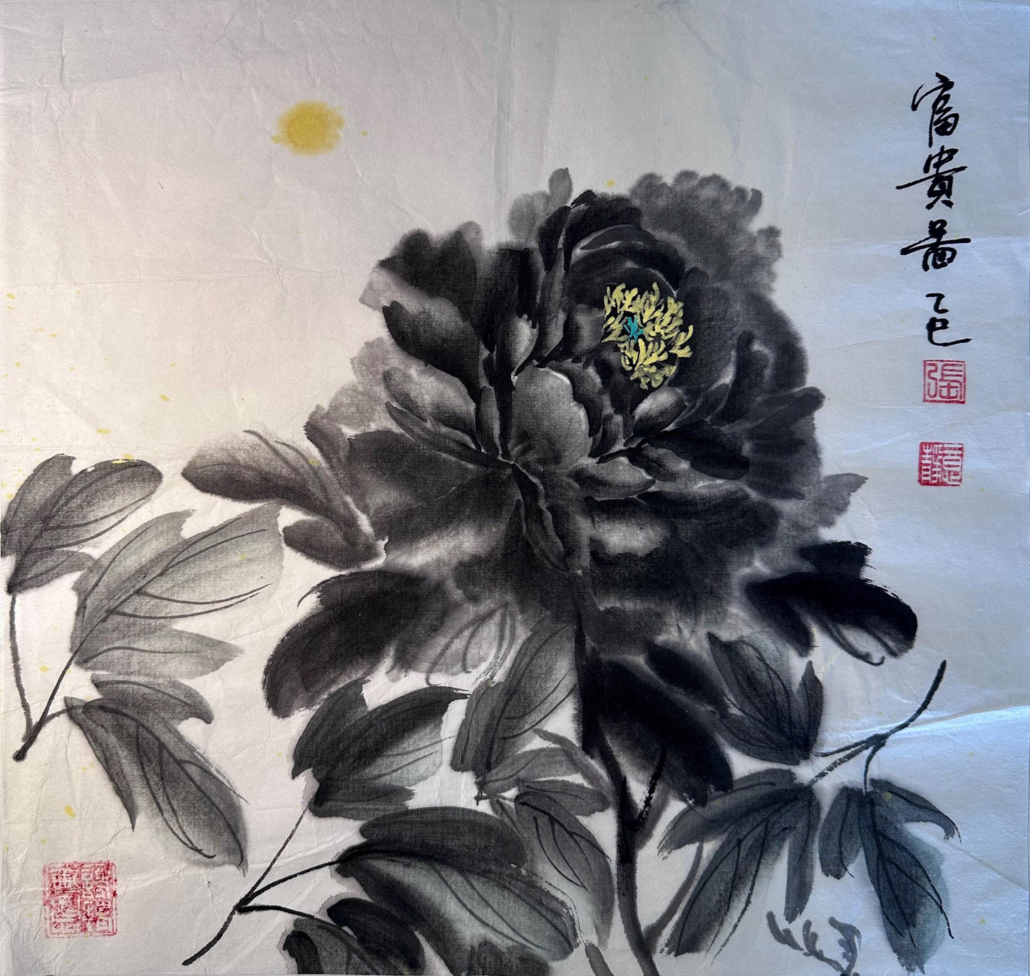 Framed black ink flower Chinese ink painting displayed as Eastern wall art in a calm interior