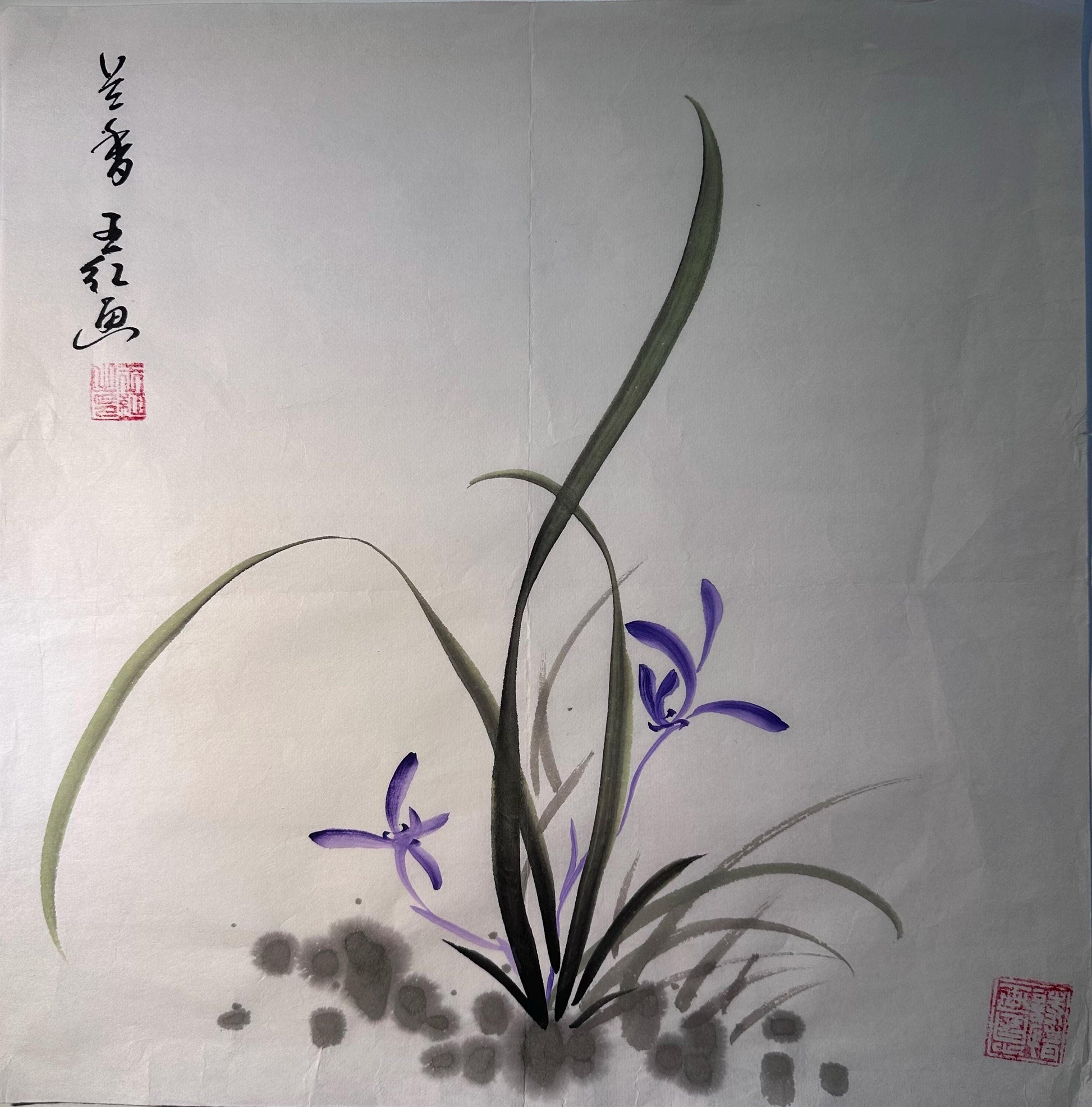 Framed Orchid Fragrance orchid Chinese ink painting displayed as Eastern wall art in a calm interior