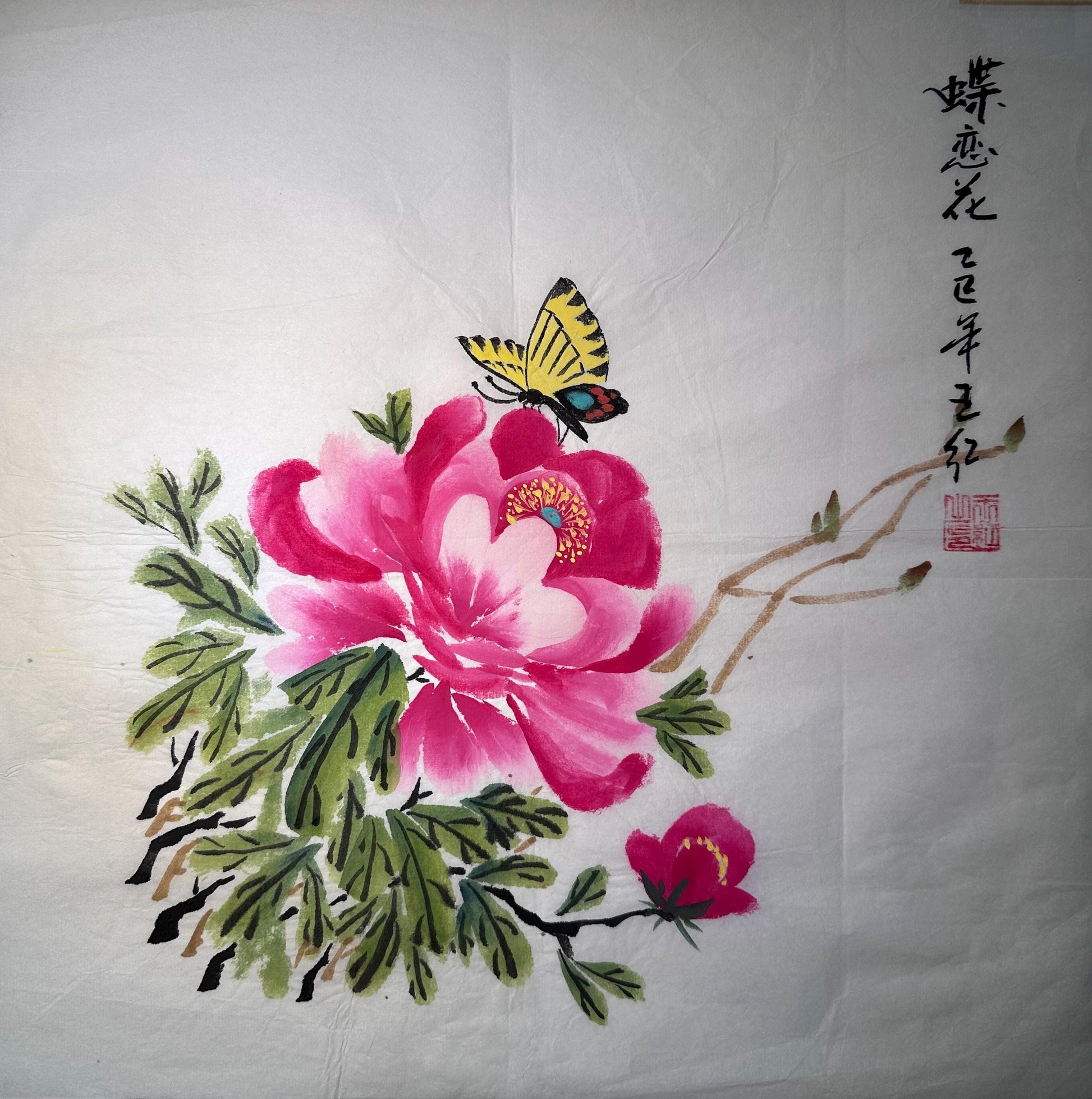 Framed butterfly and blossoms Chinese ink painting displayed as Eastern wall art in a calm interior