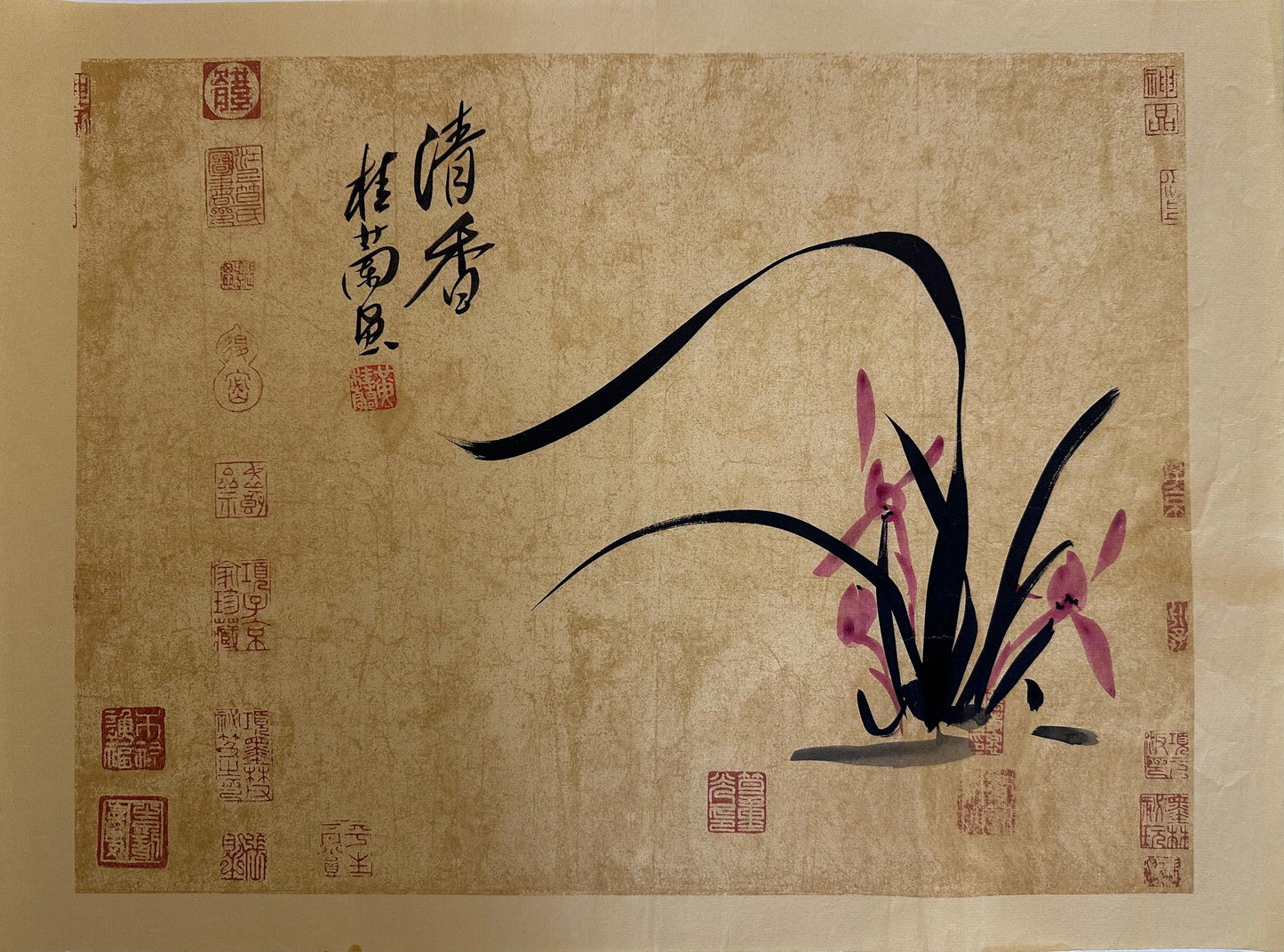 Framed Qing Xiang orchid Chinese ink painting displayed as Eastern wall art in a calm interior